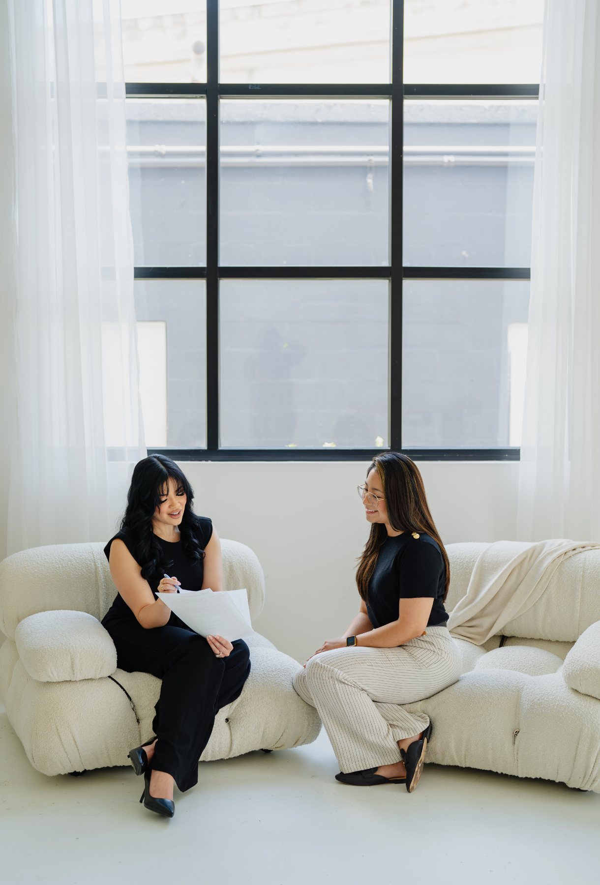 Amber Dinh reviewing a tax plan with a client