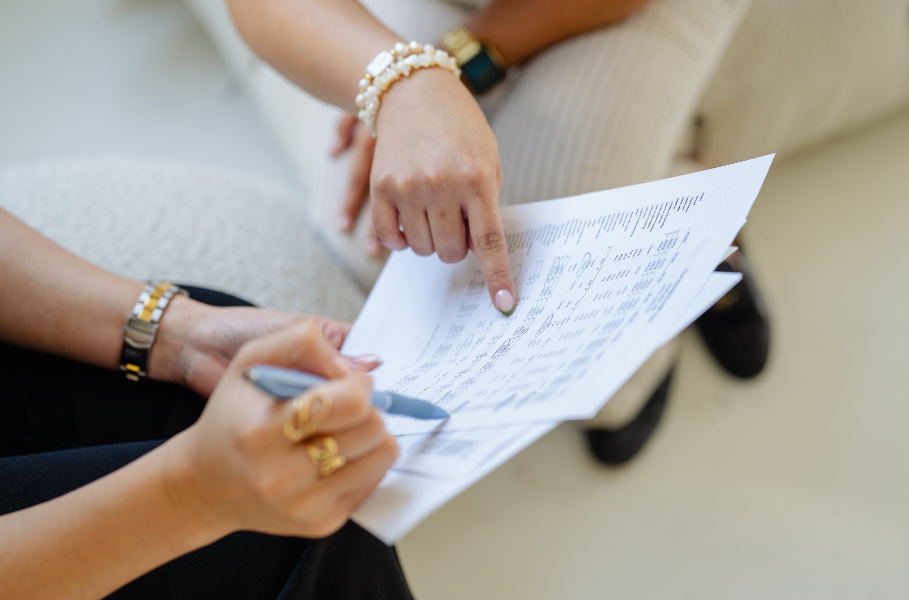 Amber Dinh walking a client through her financial statements